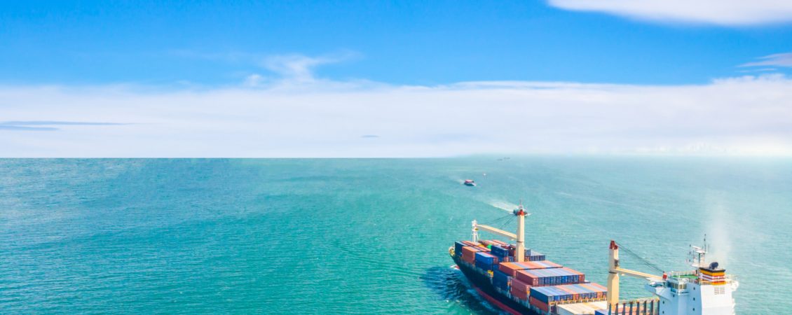 aerial-view-of-cargo-ships-that-run-in-the-middle-of-the-sea-are-transported-container-to-the-port-import-export-and-shipping-business-logistic-and-transportation-of-international-by-ship