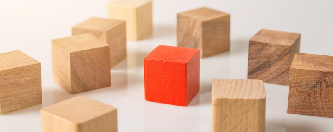 red-and-brown-wooden-geometric-shapes-cube-isolated-on-white-background